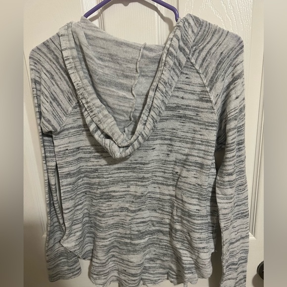 Soft and sexy shirt! XS (us) but fits bigger. - Picture 3 of 3